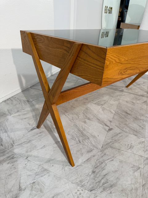 Italian desk with dark green glass top.