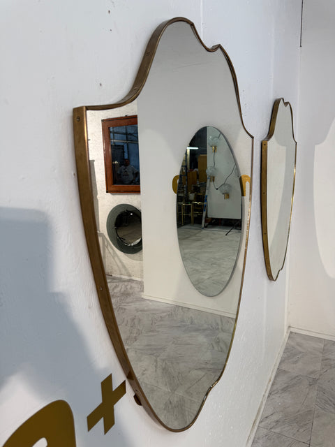 Pair of Italian Brass Framed Shield Form Wall Mirrors, 1950s