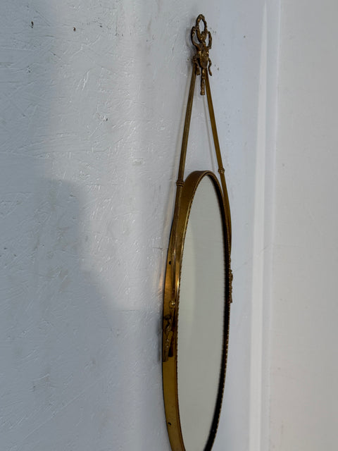 Italian Neoclassical Oval Mirror with Brass Ribbon and Tassel Detailing, 1950s