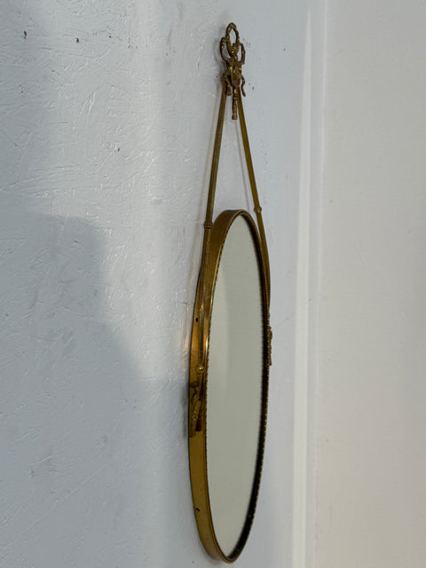 Italian Neoclassical Oval Mirror with Brass Ribbon and Tassel Detailing, 1950s