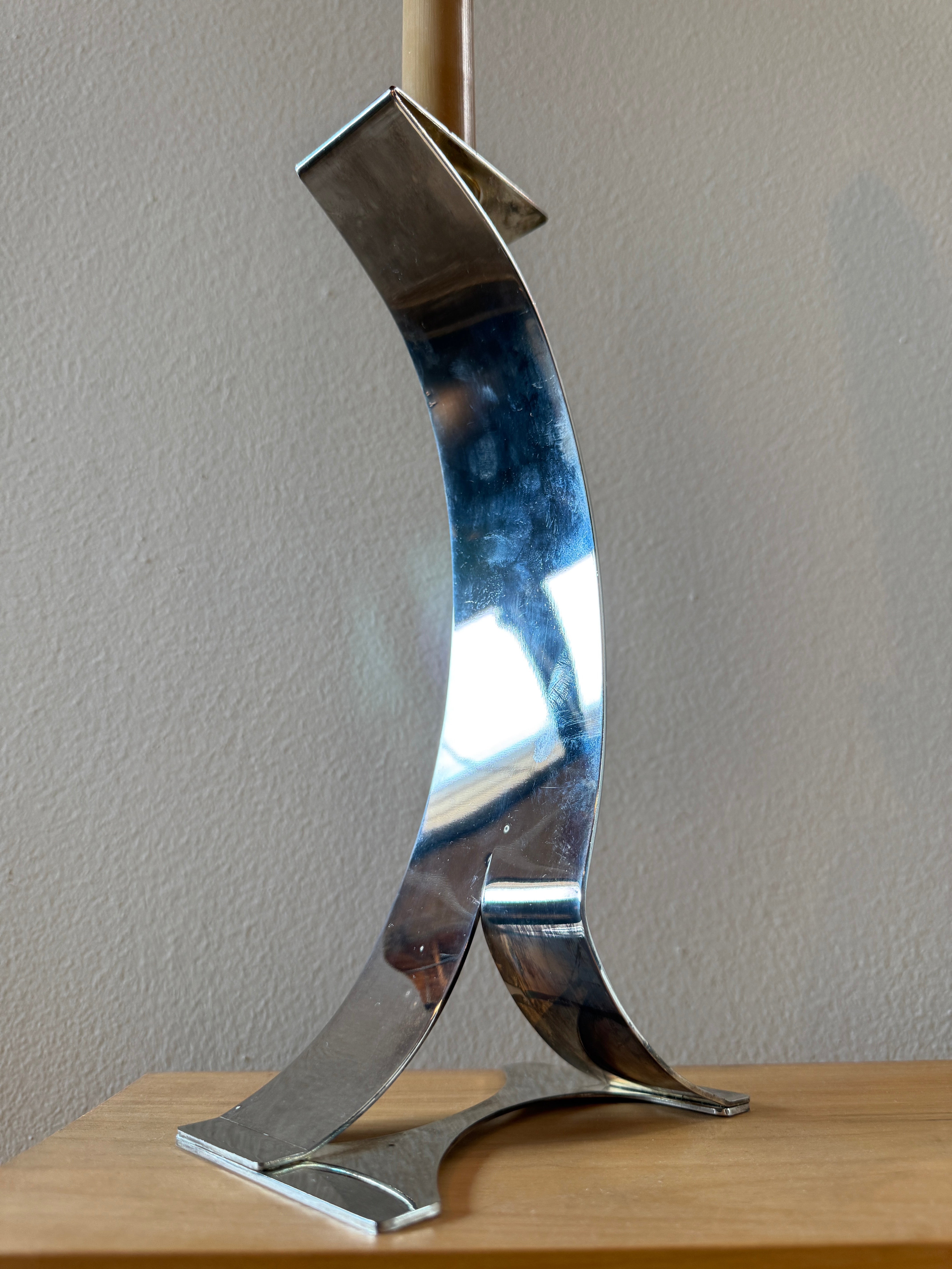 Mid-Century Sculptural Chrome Candlestick with Curved Stem and Architectural Base